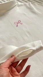 یقه اسکی دخترانه سفید طرح پاپیون صورتی